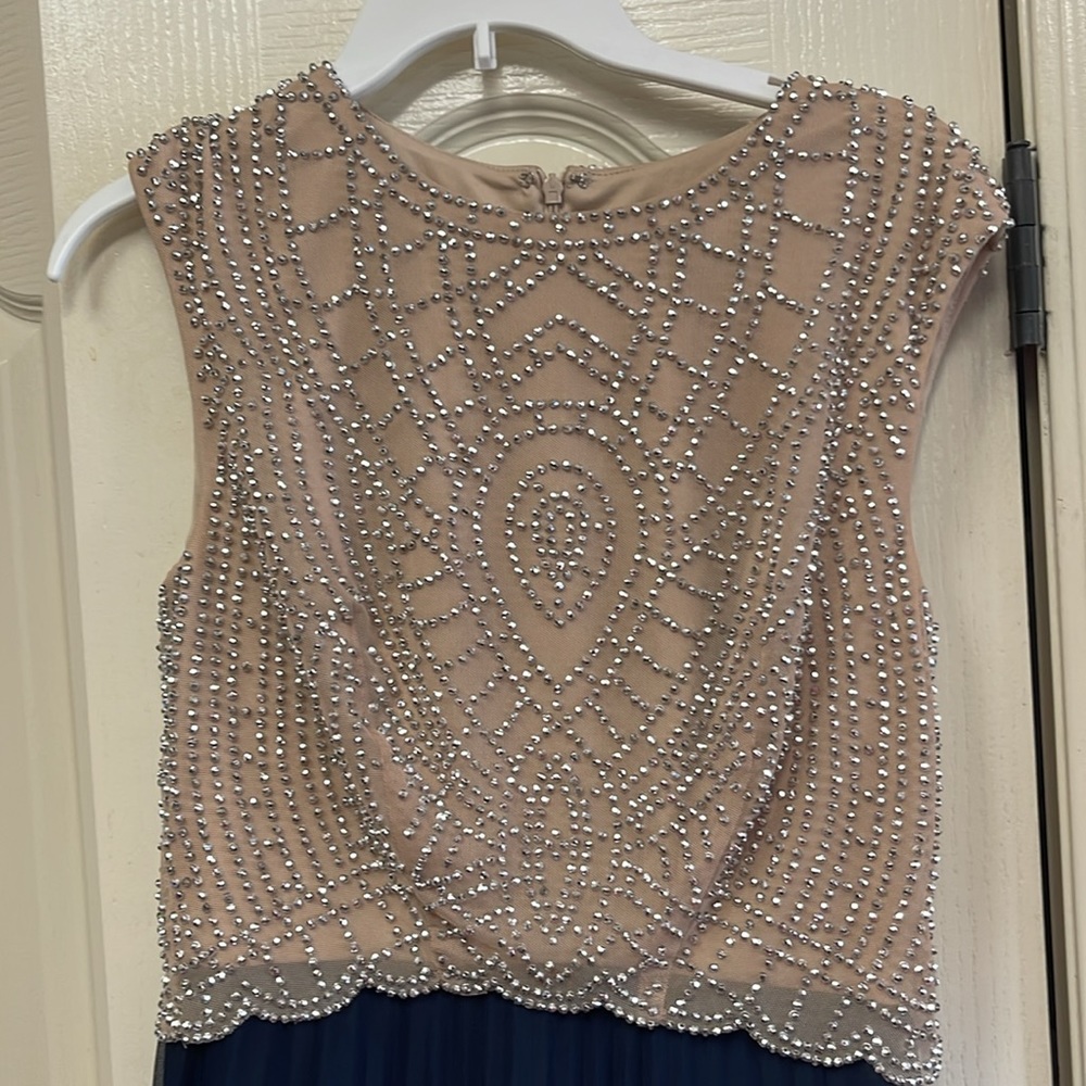 Beautiful dress worn once, no tears, no stains. Like new